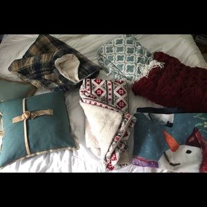 Assorted accent pillows and blankets